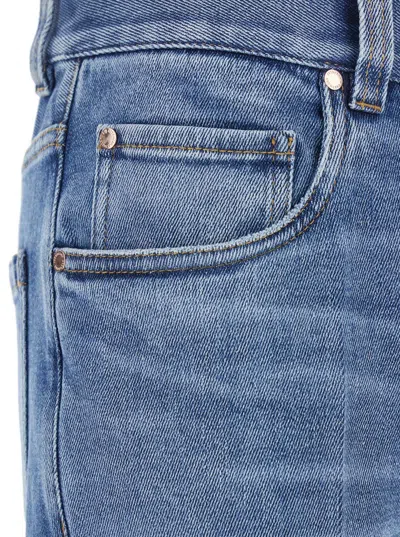 Brunello Cucinelli Blue Jeans With Logo Patch On The Rear And Faded Effect In Blue