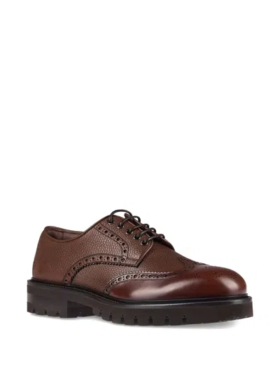 Ferragamo Leather Brogue Shoes In Brown