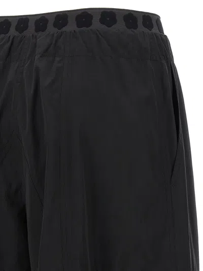 Kenzo 'boke Flower 2.0' Black Pants With Flowers Embellishmed Waist And Logo Patch On The Pocket In Black