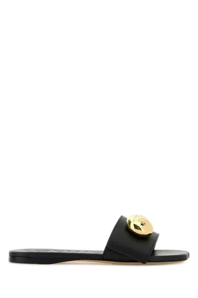 Loewe Elegant Black Calf Leather Sandals With Gold Embellishment In Black