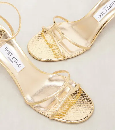 Jimmy Choo 1998 Leo 65 Metallic Leather Sandals In Gold