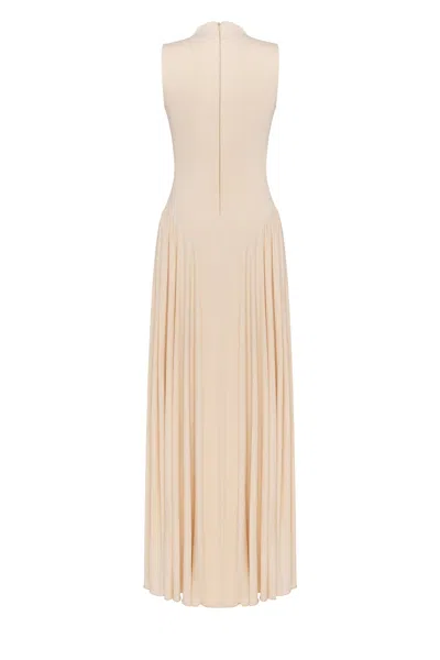 Milla Nude Sleeveless Mock Neck Dress With A Pleated Maxi Skirt