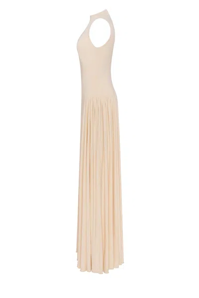 Milla Nude Sleeveless Mock Neck Dress With A Pleated Maxi Skirt