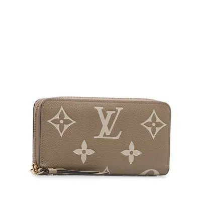 Pre-owned Louis Vuitton Beige Tourterelle Leather Long Wallet (bi-fold) () In Brown
