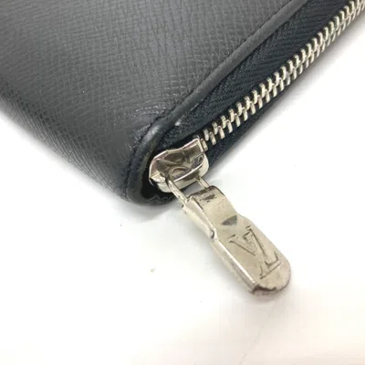 Pre-owned Louis Vuitton Black Noir Taiga Leather Leather Long Wallet (bi-fold) ()
