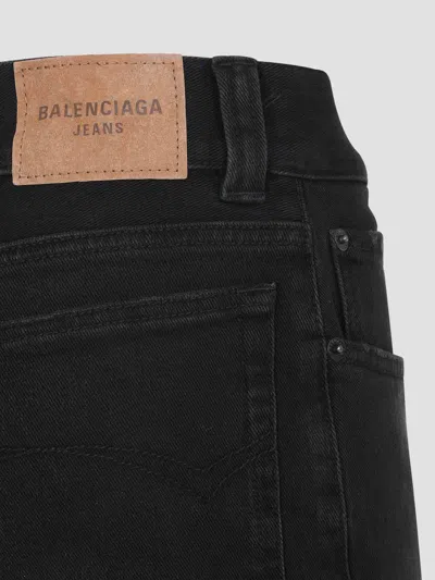 Balenciaga Flared Trousers With High Waist And Raw Hem In Black