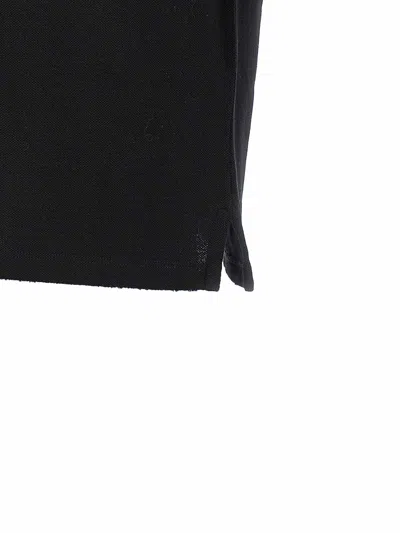 Alexander Mcqueen Inverted Skull Polo Shirt In Black