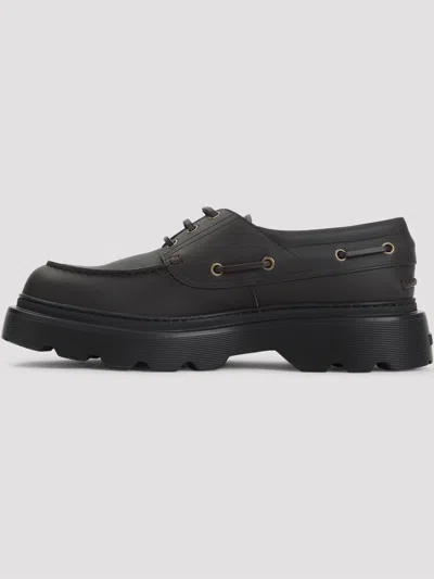 Tod's Leather Loafers Designed For Nautical Wear In Black