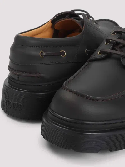 Tod's Leather Loafers Designed For Nautical Wear In Black