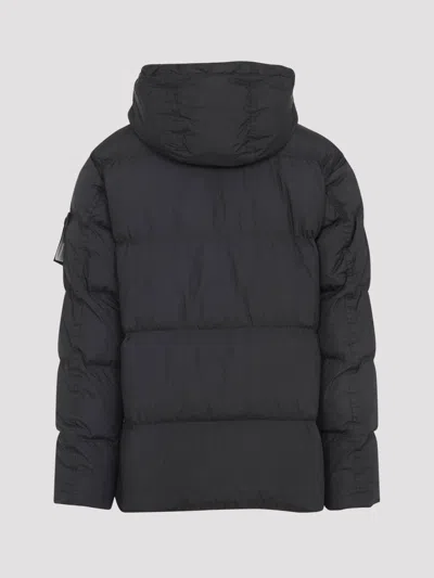Stone Island Blue Down Jacket With Drawstring Hood And Logo Patch On The Sleeve In Tech Fabric Man In Black
