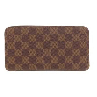 Pre-owned Louis Vuitton Damier Canvas Ebene Damier Canvas Long Wallet (bi-fold) () In Brown
