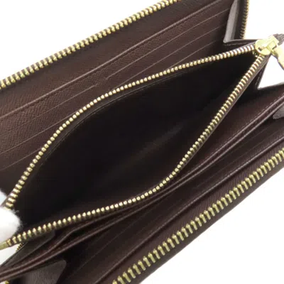 Pre-owned Louis Vuitton Damier Canvas Ebene Damier Canvas Long Wallet (bi-fold) () In Brown