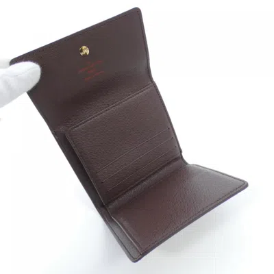 Pre-owned Louis Vuitton Ebene Coated Canvas Middle Wallet (bi-fold) ()