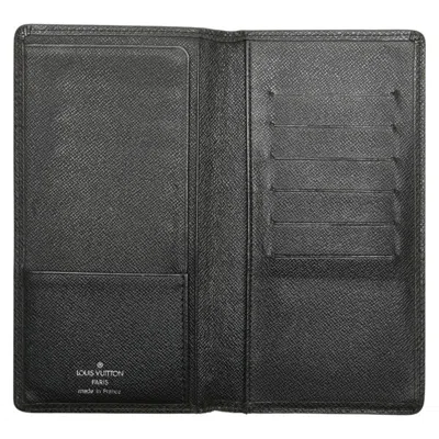Pre-owned Louis Vuitton Taiga Black Leather Wallet (bi-fold) ()