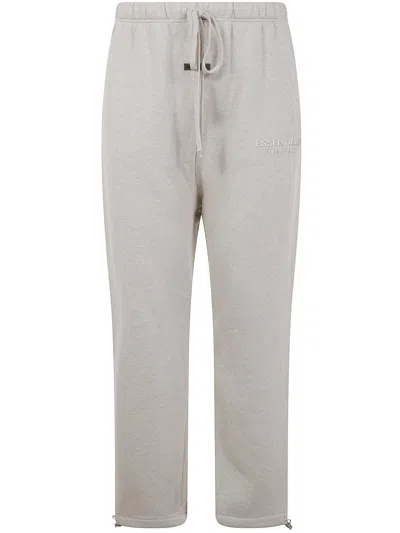 Essentials Relaxed Fleece Sweatpant By Fear Of God Essenti In Brown