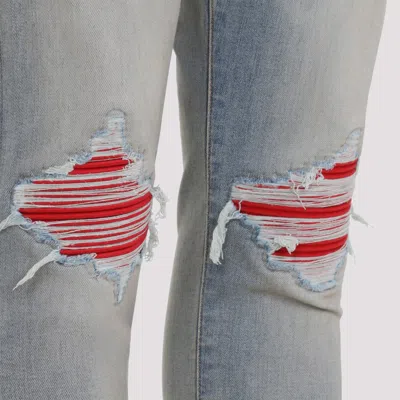 Amiri Mx1 Slim Fit Jeans With Distressed Red Accents
