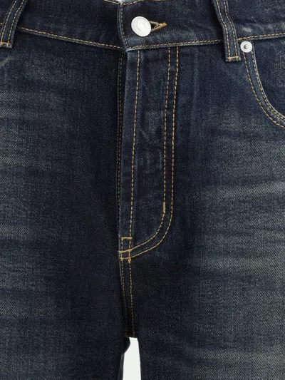 Alexander Mcqueen Wide Leg Faded Jeans In Black