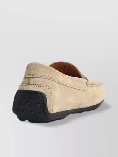 Tod's Suede Loafers With Rubber Sole And Stitch Detailing In Gold