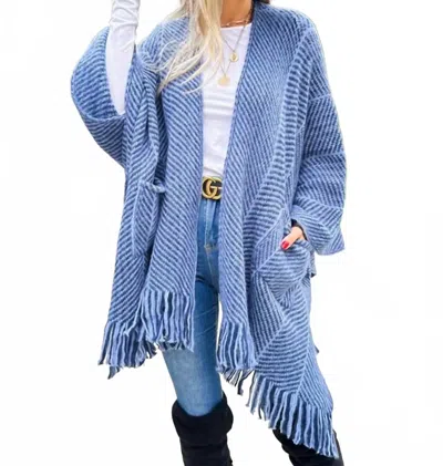 Amoli Chevron Knitted Ruana Cardigan With Tassel And Pocket In Blue