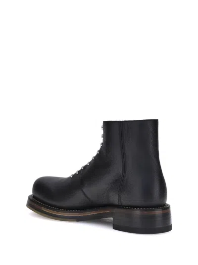 Alexander Mcqueen Chunky Sole Round Toe Studded Ankle Boots