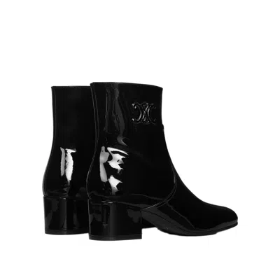 Celine Women Patent Leather Boots With Engraved Triomphe Logo In Black