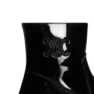Celine Women Patent Leather Boots With Engraved Triomphe Logo In Black