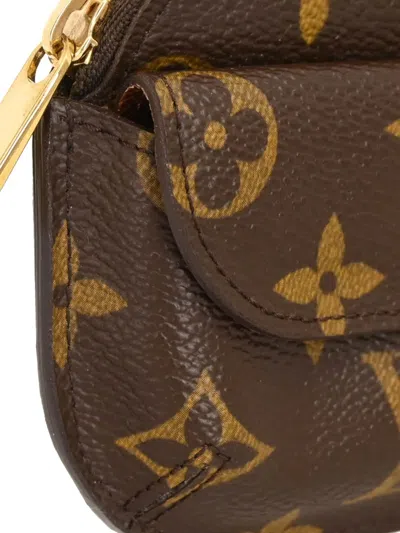 Pre-owned Louis Vuitton 2006 Monogram Shilling Coin Wallet In Brown