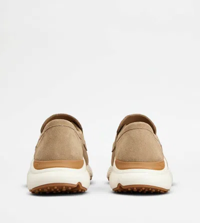 Tod's Round Toe Low-top Sneakers In Gold