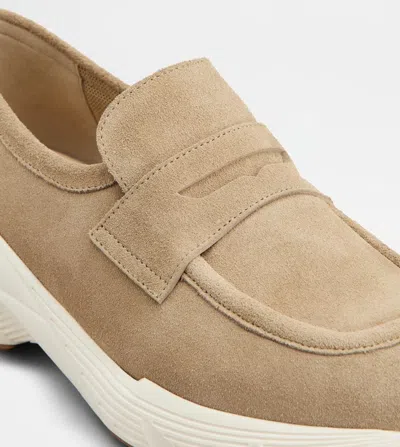 Tod's Round Toe Low-top Sneakers In Gold