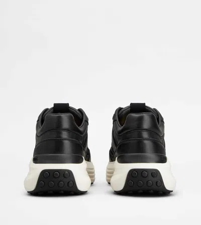 Tod's Round Toe Sneakers In Black