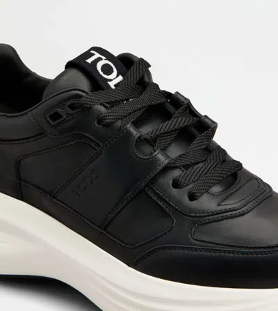 Tod's Round Toe Sneakers In Black