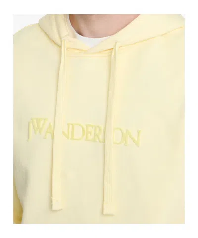 Jw Anderson Logo Embroidery Hoodie In Yellow