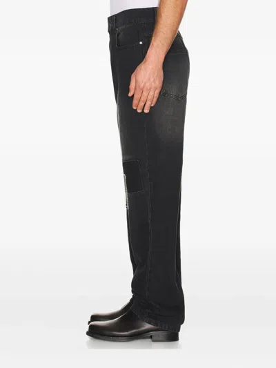 Sinclair Patchwork Panel Jeans In Black