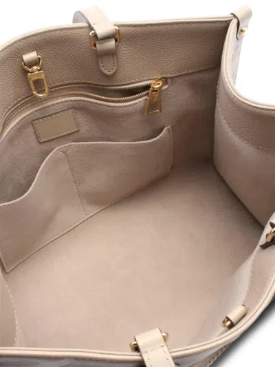 Pre-owned Louis Vuitton 2021 On-the-go Mm Handbag In Neutral