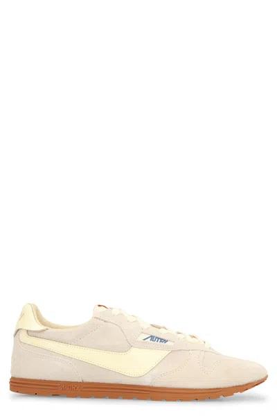 Autry Low Suede Leather Sneakers With Perforated Toe In Neutral