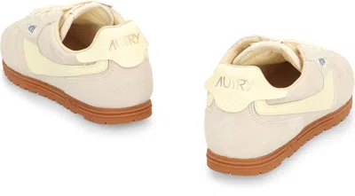 Autry Low Suede Leather Sneakers With Perforated Toe In Neutral