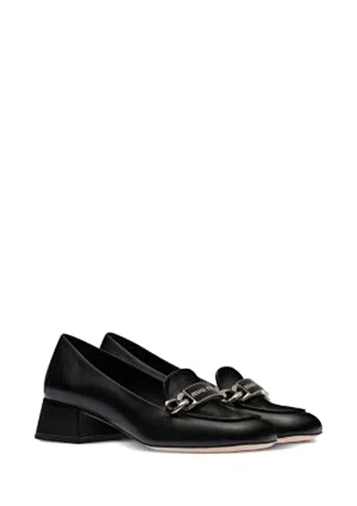Miu Miu Logo-plaque Leather Loafers In Black
