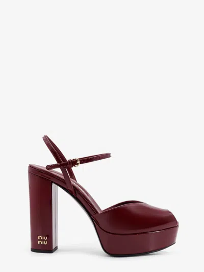 Miu Miu Patent Leather Sandals With Heel And Wedge