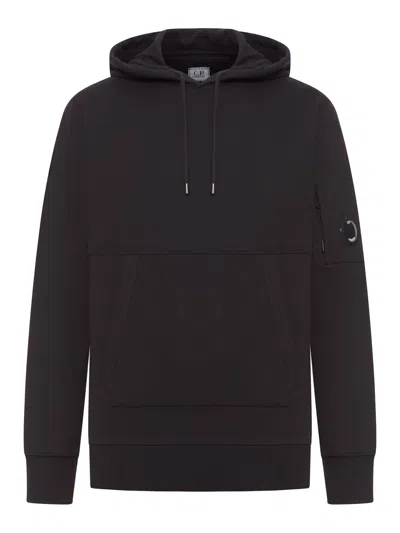 C.p. Company Diagonal Raised Fleece Hooded Sweatshirt With Iconic Lens Detail In Black