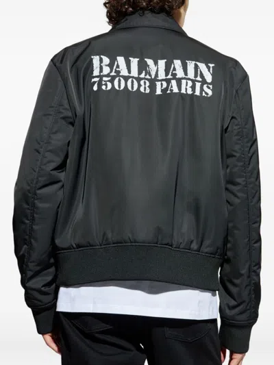 Balmain Contemporary Black Coat With Ribbed Cuffs And Flap Pockets In Black