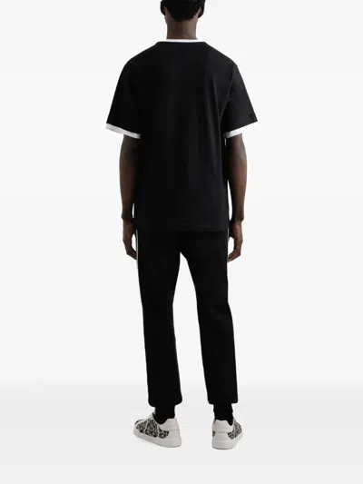 Dolce & Gabbana Jersey Trousers With Print And Embroidery In Black
