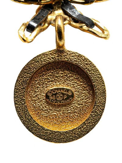 Pre-owned Chanel 1996 Leather And Gold Plated Medallion Bow Pendant Costume Necklace