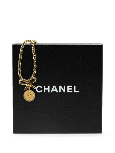 Pre-owned Chanel 1996 Leather And Gold Plated Medallion Bow Pendant Costume Necklace
