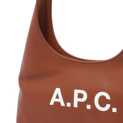 Apc A.p.c. Baby Ninon Shoulder Bag With Logo Print In Brown