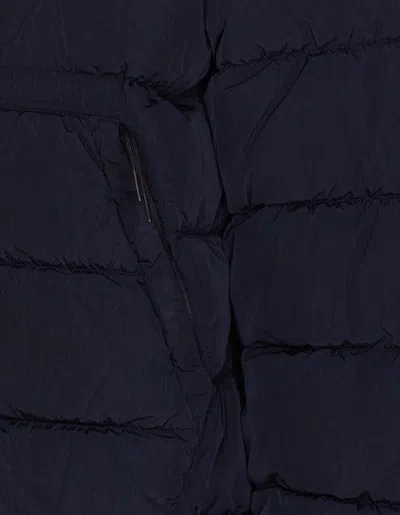 C.p. Company Blue Down Jacket With Fixed Hood And Logo Plaque On The Sleeve In Tech Fabric Man In Blue