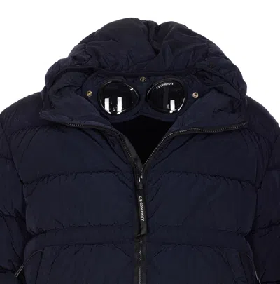 C.p. Company Blue Down Jacket With Fixed Hood And Logo Plaque On The Sleeve In Tech Fabric Man In Blue