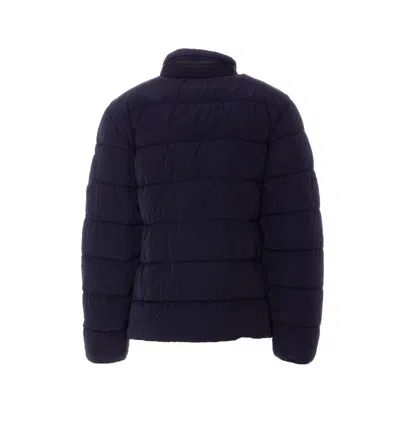 C.p. Company Blue Down Jacket With Fixed Hood And Logo Plaque On The Sleeve In Tech Fabric Man In Blue