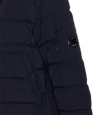 C.p. Company Blue Down Jacket With Fixed Hood And Logo Plaque On The Sleeve In Tech Fabric Man In Blue