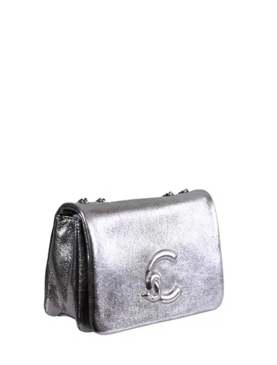 Coccinelle Bags.. In Silver