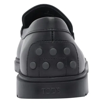 Tod's Flat Shoes In Black